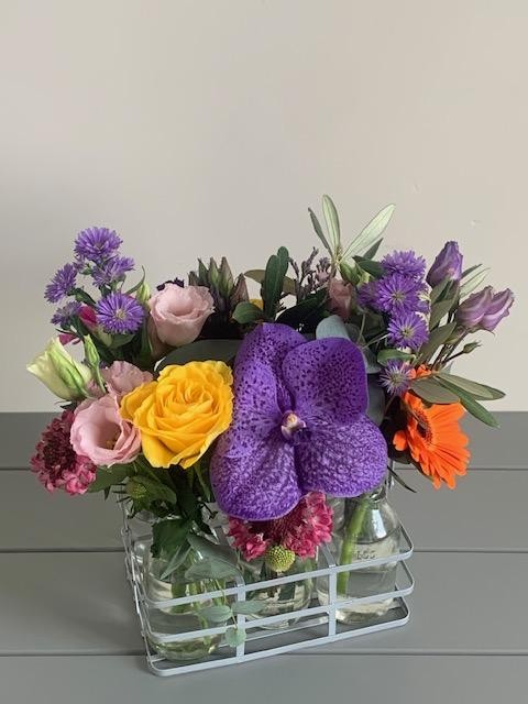 Seasonal Blooms in Miniture Bottles