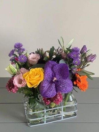 Seasonal Blooms in Miniture Bottles